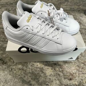 Adidas White Sneakers with Gold Accents